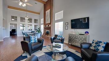 Black leather couch in a room